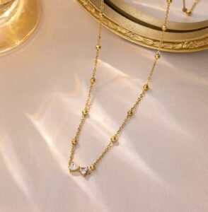 Bow pendant necklace (stainless steel) product photo 2 | Glossy.pk Pakistan