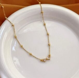 Bow pendant necklace (stainless steel) — jewellery from Glossy.pk, Pakistan