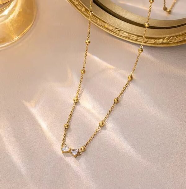 Bow pendant necklace (stainless steel) product photo 4 | Glossy.pk Pakistan