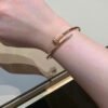 Nail Bangle — Stainless Steel, Gold Plated product photo 2 | Glossy.pk Pakistan