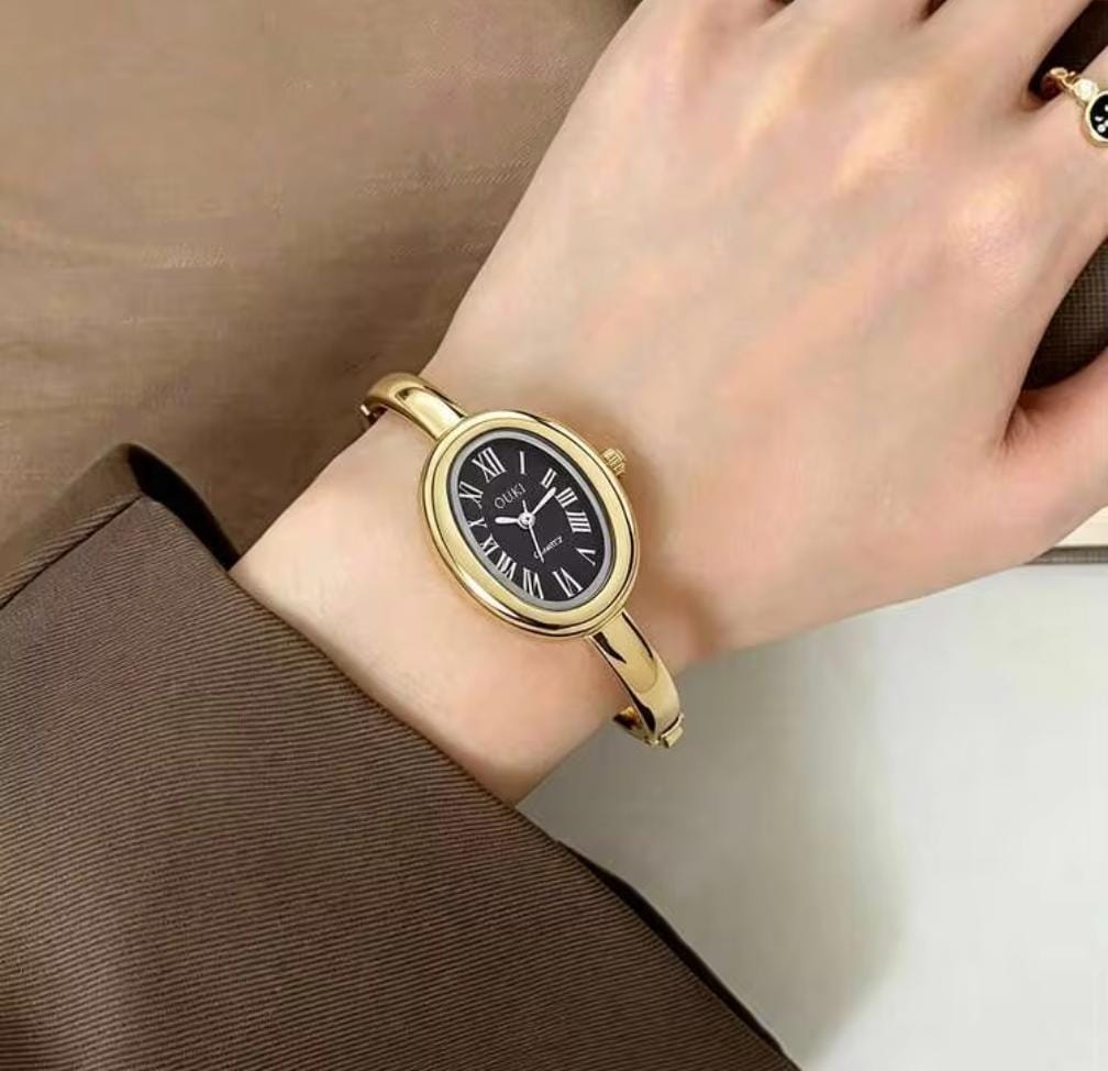 8acd7c64-0839-4f75-b047-b789c3b000f7 Cosmo Bangle Watch-Gold Black - Image 1