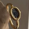 Cosmo Gold Bangle Watch — Black Dial product photo 3 | Glossy.pk Pakistan