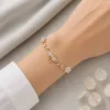 Bow Tulip Bracelet — White Stone product photo 2 | Glossy.pk Pakistan